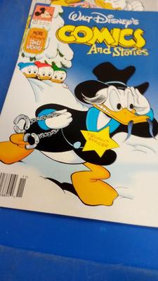 LOT 29 LOT OF FOUR VINTAGE WALT DISNEY COMICS