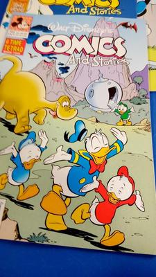 LOT 29 LOT OF FOUR VINTAGE WALT DISNEY COMICS