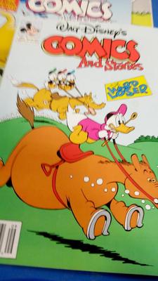 LOT 29 LOT OF FOUR VINTAGE WALT DISNEY COMICS