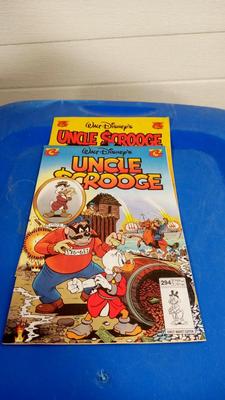 LOT 31 TWO WALT DISNEY UNCLE SCROOGE COMIC BOOKS