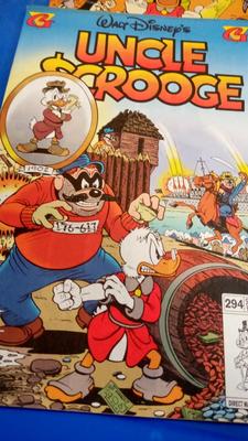 LOT 31 TWO WALT DISNEY UNCLE SCROOGE COMIC BOOKS