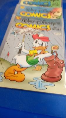 LOT 34 THREE VINTAGE WALT DISNEY COMIC BOOKS