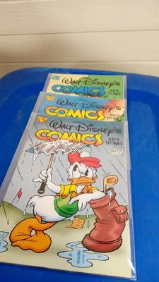 LOT 34 THREE VINTAGE WALT DISNEY COMIC BOOKS
