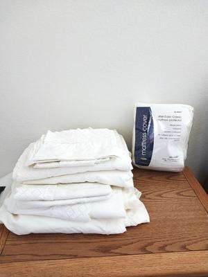 Two Sets of Sheet & Pillowcases and New Mattress Cover