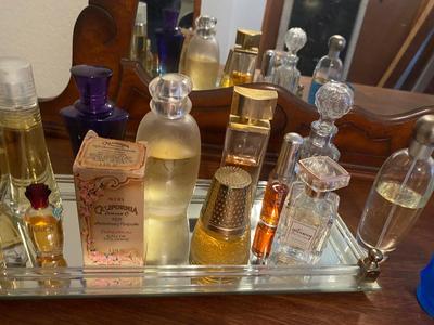 PERFUME BOTTLES ON VINTAGE MIRRORED TRAY