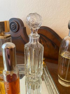 PERFUME BOTTLES ON VINTAGE MIRRORED TRAY