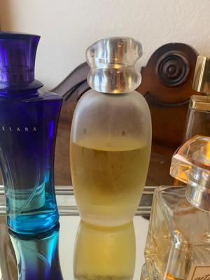 PERFUME BOTTLES ON VINTAGE MIRRORED TRAY