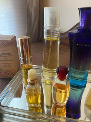 PERFUME BOTTLES ON VINTAGE MIRRORED TRAY