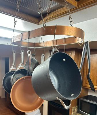 Sale Photo Thumbnail #333: This copper hanging rack for pots and pans includes all items shown in the photos.