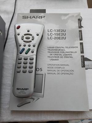 APEX DVD Player and Sharp Liquid Crystal Television With Remotes