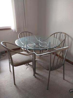 Glass top Table and Four Chairs