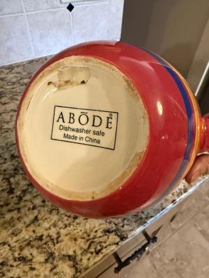Abode pitcher with stripes
