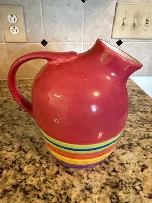 Abode pitcher with stripes