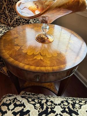 Exquisite Maitland Smith round table with bottom shelf