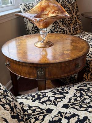 Exquisite Maitland Smith round table with bottom shelf