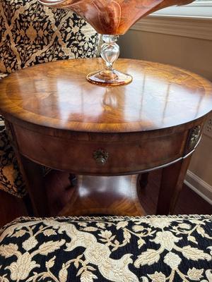 Exquisite Maitland Smith round table with bottom shelf