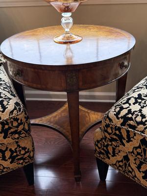 Exquisite Maitland Smith round table with bottom shelf