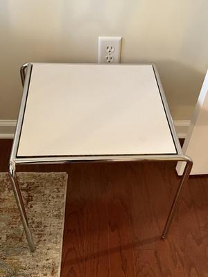 Three great white and chrome side tables