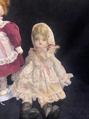 2 PORCELAIN DOLLS