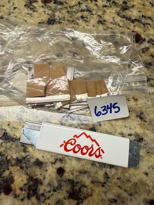 Coors box opener w/ a couple of extra blades