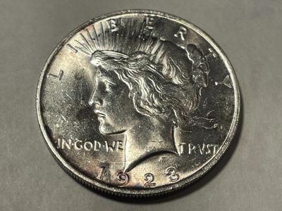 1923-P MS60/UNCIRCULATED CONDITION (UNCERTIFIED) PEACE SILVER DOLLAR AS PICTURED.