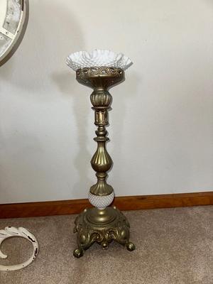 HANGING CLOCK ON AN IRON FRAME AND 2 FLOOR PILLAR CANDLE HOLDERS