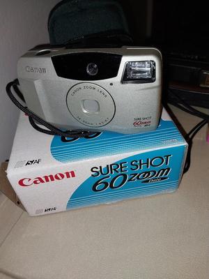 Canon sure Shot Camera -Kodax Ektralite and New Timex Alarm Clock