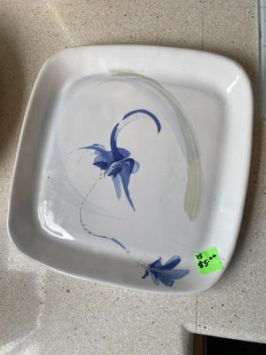 Lot of Assorted Plates and Cutting Board.