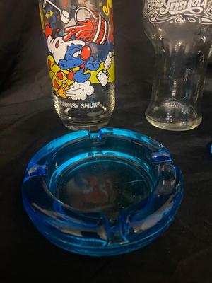 BLUE TIARA GLASS ASH TRAY AND LIGHTER, 1083 SMURFS COLLECTIBLE GLASSES, AND MORE