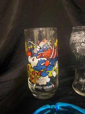 BLUE TIARA GLASS ASH TRAY AND LIGHTER, 1083 SMURFS COLLECTIBLE GLASSES, AND MORE