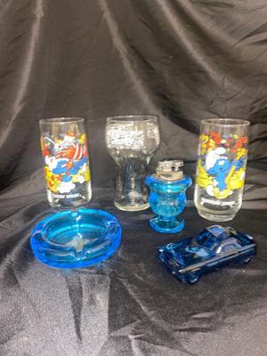 BLUE TIARA GLASS ASH TRAY AND LIGHTER, 1083 SMURFS COLLECTIBLE GLASSES, AND MORE