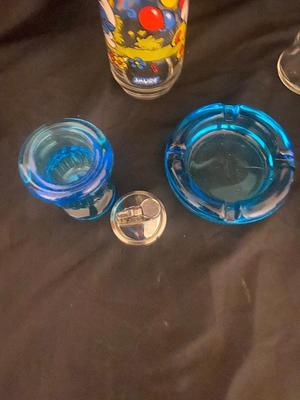 BLUE TIARA GLASS ASH TRAY AND LIGHTER, 1083 SMURFS COLLECTIBLE GLASSES, AND MORE