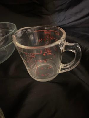 A VARIETY OF DIFFERENT BOWLS AND KITCHEN ITEMS