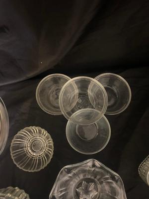 A VARIETY OF DIFFERENT BOWLS AND KITCHEN ITEMS
