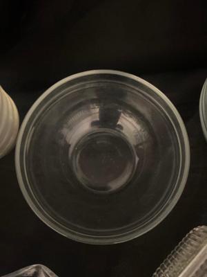 A VARIETY OF DIFFERENT BOWLS AND KITCHEN ITEMS