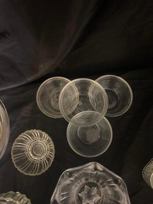 A VARIETY OF DIFFERENT BOWLS AND KITCHEN ITEMS