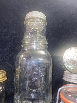 ANTIQUE AND VINTAGE CANNING JARS WITH LIDS & A CHEMICAL BOTTLE