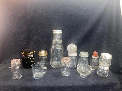ANTIQUE AND VINTAGE CANNING JARS WITH LIDS & A CHEMICAL BOTTLE
