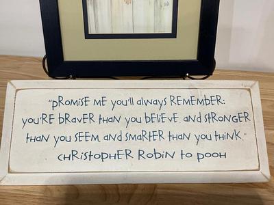 Framed boy with calf picture and CR to Pooh decor