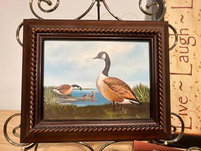 Framed duck print with decor