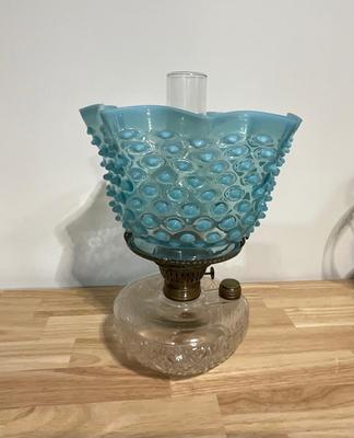 Vintage electric and oil burning lamps.
