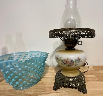 Vintage electric and oil burning lamps.
