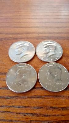LOT 103 FOUR 2004-P KENNEDY HALF DOLLARS