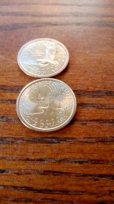 LOT 110 TWO UNC DOLLAR COINS