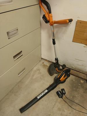 Worx 20-volt battery operated weed eater and leaf blower with 4 batteries and 1 charger