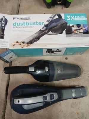 Handheld vacuum with battery and charger