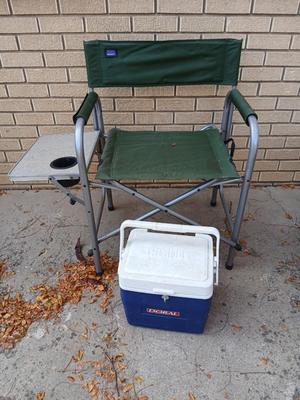 MAC folding chair with side table and a small blue cooler