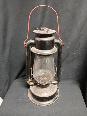Vintage kerosene lantern marked Marshwells No. 32 Cold Blast with embossed globe