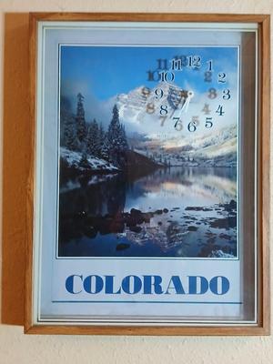 Two vintage framed Silhouette wall clocks
