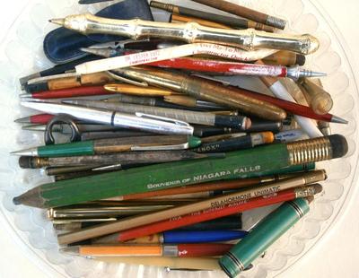 Estate accumulation of old pens and pencils